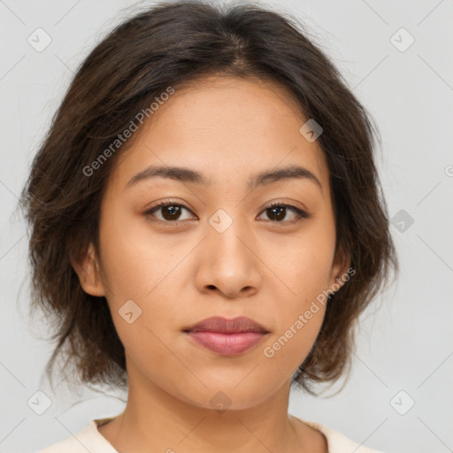 Neutral white young-adult female with medium  brown hair and brown eyes