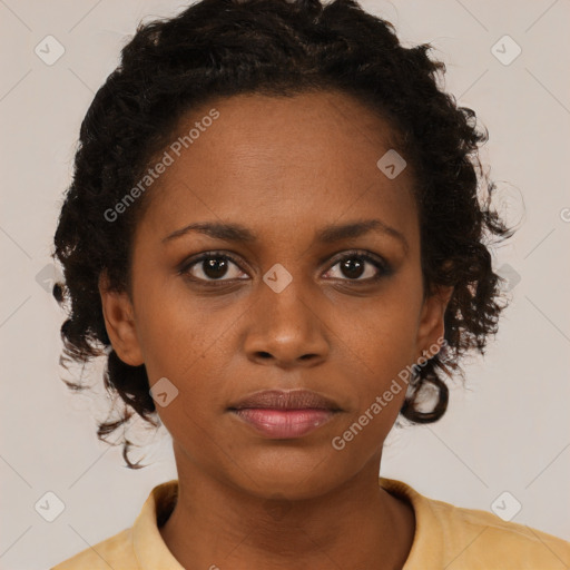 Neutral black young-adult female with short  brown hair and brown eyes