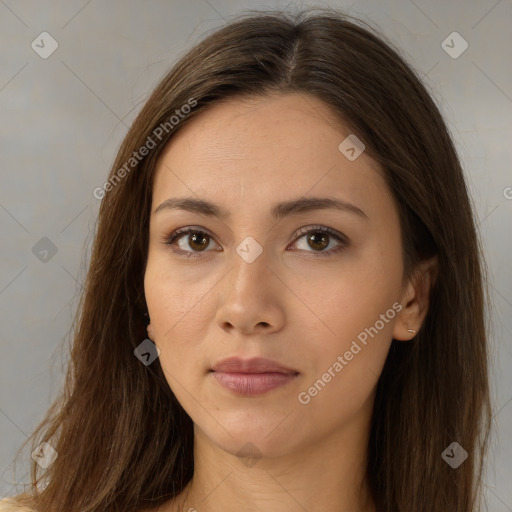 Neutral white young-adult female with long  brown hair and brown eyes