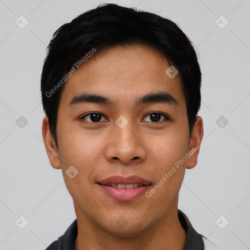 Joyful asian young-adult male with short  black hair and brown eyes