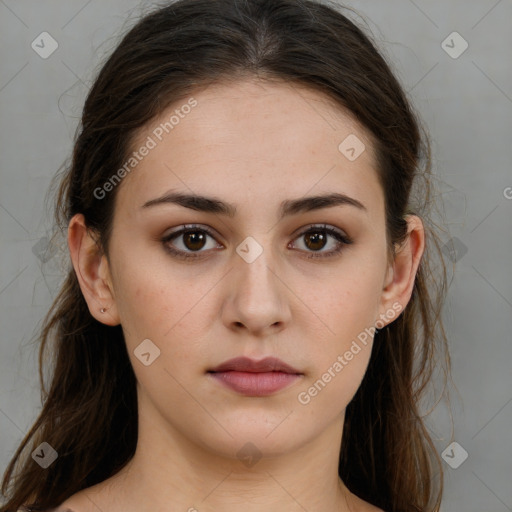 Neutral white young-adult female with long  brown hair and brown eyes