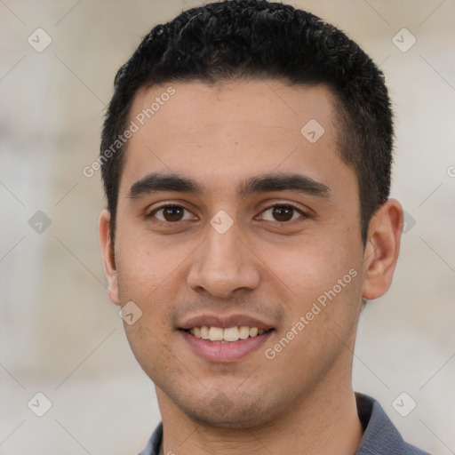 Joyful white young-adult male with short  black hair and brown eyes