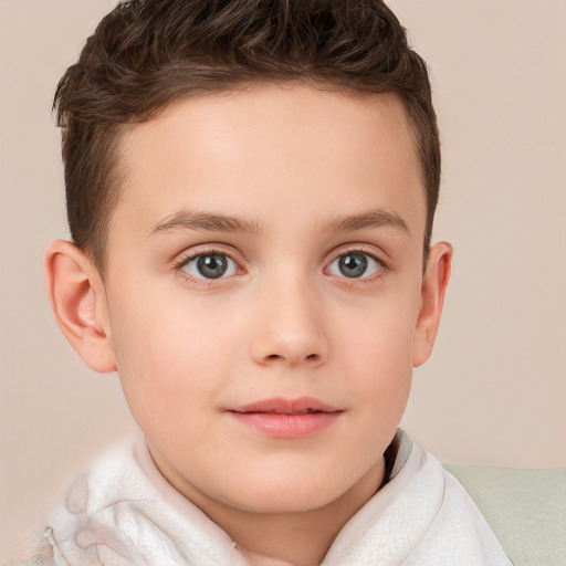 Joyful white child male with short  brown hair and brown eyes