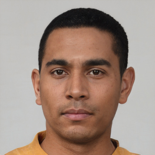 Neutral latino young-adult male with short  black hair and brown eyes