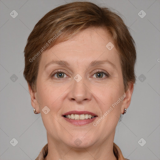 Joyful white adult female with short  brown hair and grey eyes