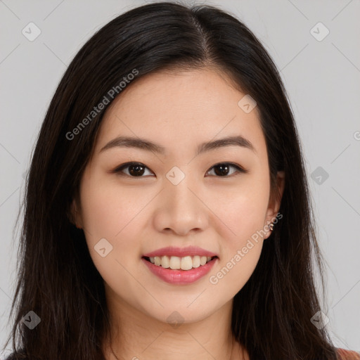 Joyful asian young-adult female with long  brown hair and brown eyes