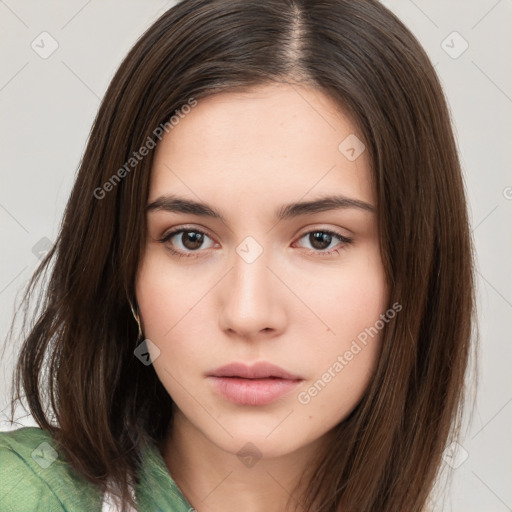 Neutral white young-adult female with long  brown hair and brown eyes