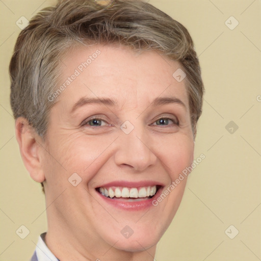 Joyful white adult female with short  brown hair and brown eyes