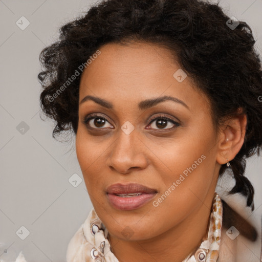 Joyful black adult female with short  brown hair and brown eyes