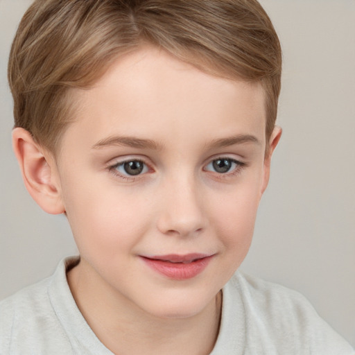 Joyful white child female with short  brown hair and grey eyes