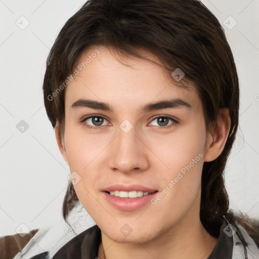 Joyful white young-adult female with medium  brown hair and brown eyes