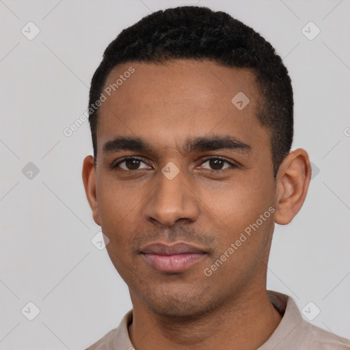 Neutral latino young-adult male with short  black hair and brown eyes