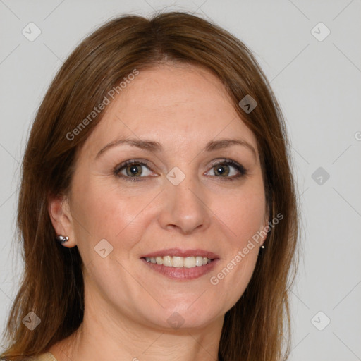 Joyful white adult female with long  brown hair and grey eyes