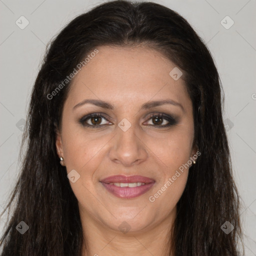 Joyful white adult female with long  brown hair and brown eyes