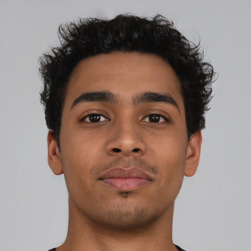 Neutral latino young-adult male with short  brown hair and brown eyes