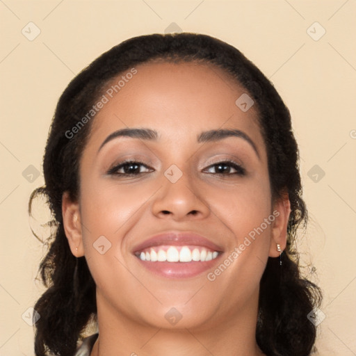 Joyful white young-adult female with long  black hair and brown eyes