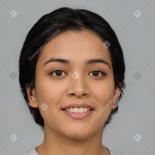 Joyful asian young-adult female with medium  black hair and brown eyes