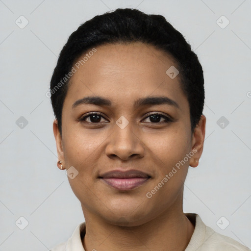 Joyful latino young-adult female with short  black hair and brown eyes