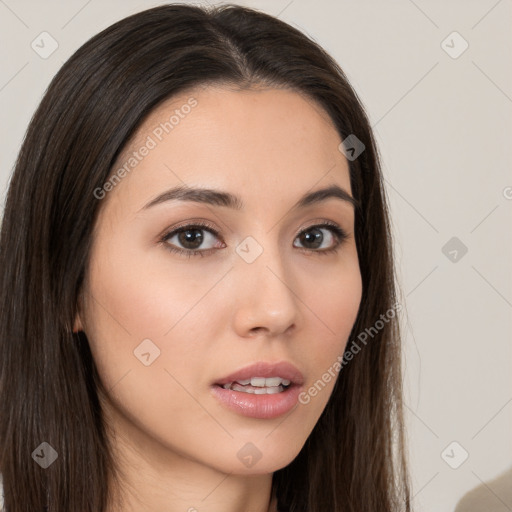 Neutral white young-adult female with long  brown hair and brown eyes