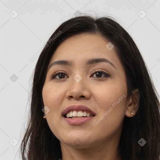 Joyful white young-adult female with long  brown hair and brown eyes