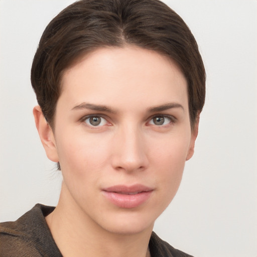 Neutral white young-adult female with short  brown hair and brown eyes