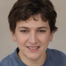 Joyful white young-adult male with medium  brown hair and brown eyes