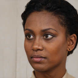 Neutral black young-adult female with short  black hair and brown eyes