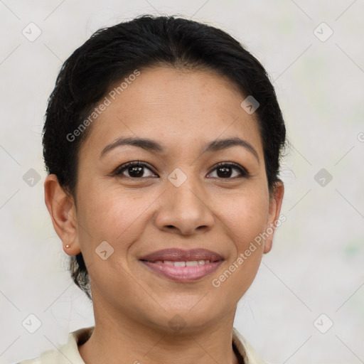 Joyful latino young-adult female with short  brown hair and brown eyes