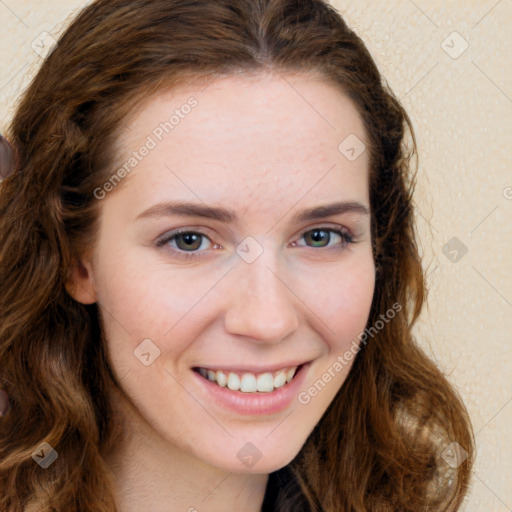 Joyful white young-adult female with long  brown hair and green eyes