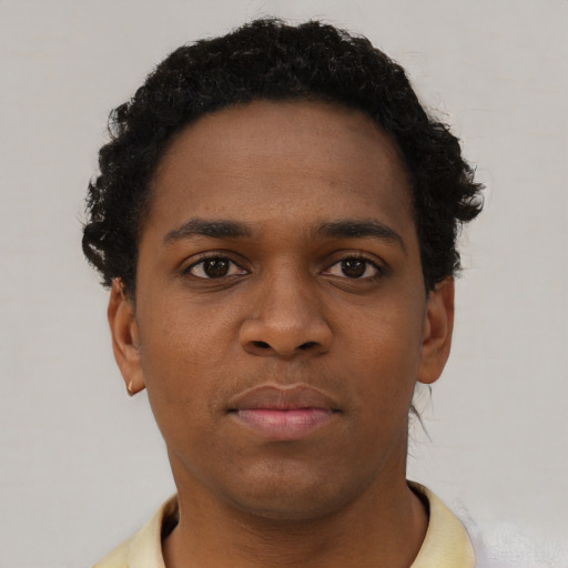 Neutral black young-adult male with short  brown hair and brown eyes
