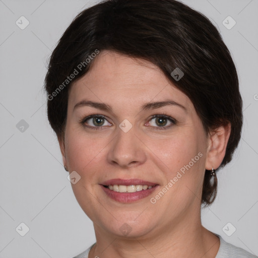 Joyful white young-adult female with medium  brown hair and grey eyes