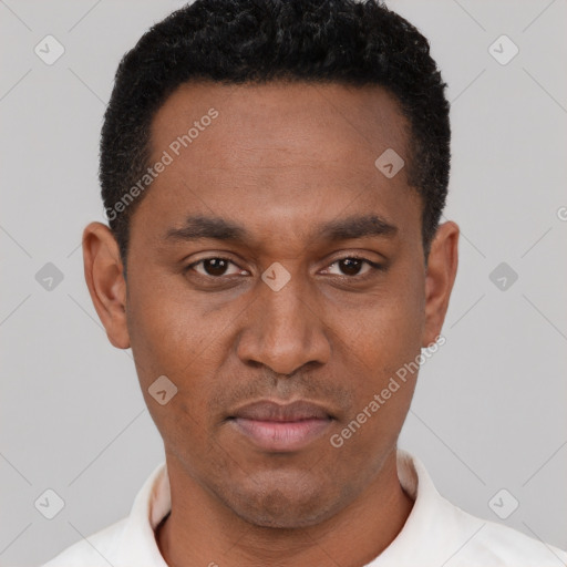 Neutral latino young-adult male with short  black hair and brown eyes
