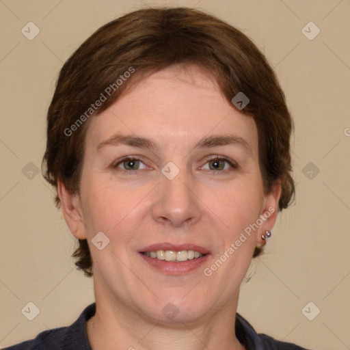 Joyful white adult female with short  brown hair and brown eyes