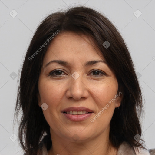 Joyful white adult female with medium  brown hair and brown eyes