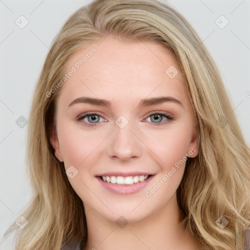 Joyful white young-adult female with long  brown hair and blue eyes