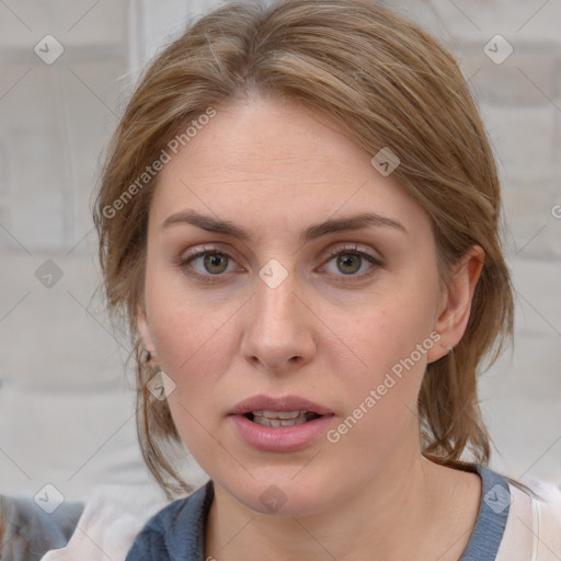 Joyful white young-adult female with medium  brown hair and blue eyes