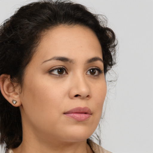 Neutral latino young-adult female with medium  brown hair and brown eyes