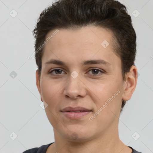 Joyful white young-adult female with short  brown hair and brown eyes