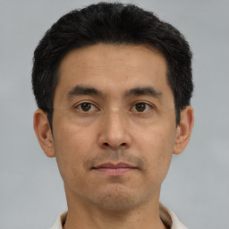 Neutral asian young-adult male with short  black hair and brown eyes