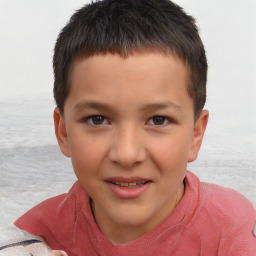 Joyful white child male with short  brown hair and brown eyes