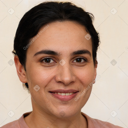 Joyful white adult female with short  brown hair and brown eyes