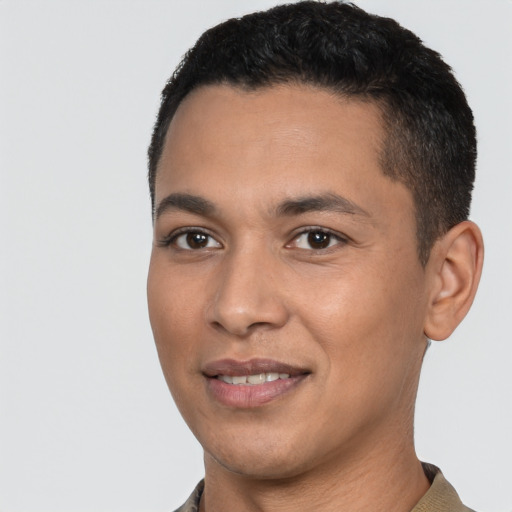 Joyful white young-adult male with short  black hair and brown eyes