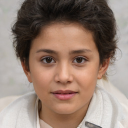 Joyful white child female with short  brown hair and brown eyes