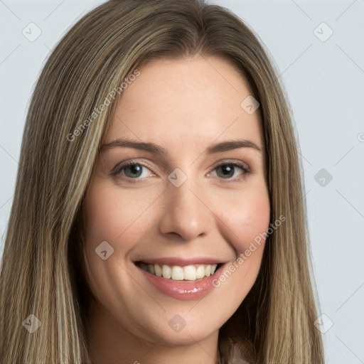 Joyful white young-adult female with long  brown hair and green eyes