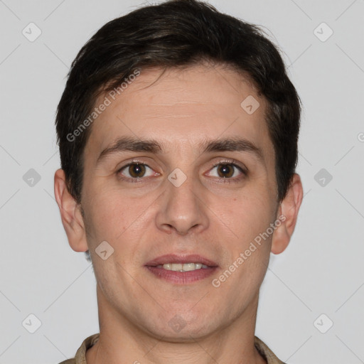 Joyful white young-adult male with short  brown hair and brown eyes