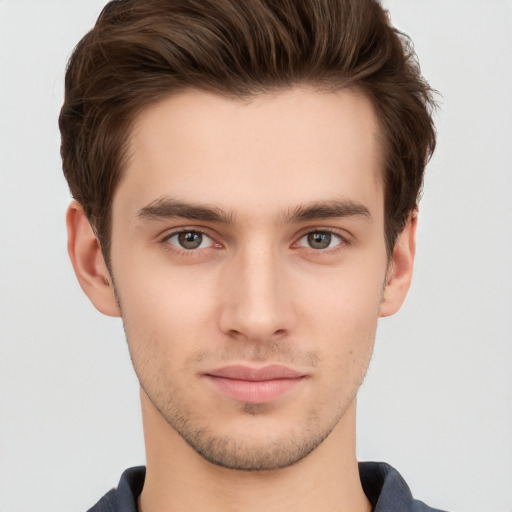 Neutral white young-adult male with short  brown hair and brown eyes