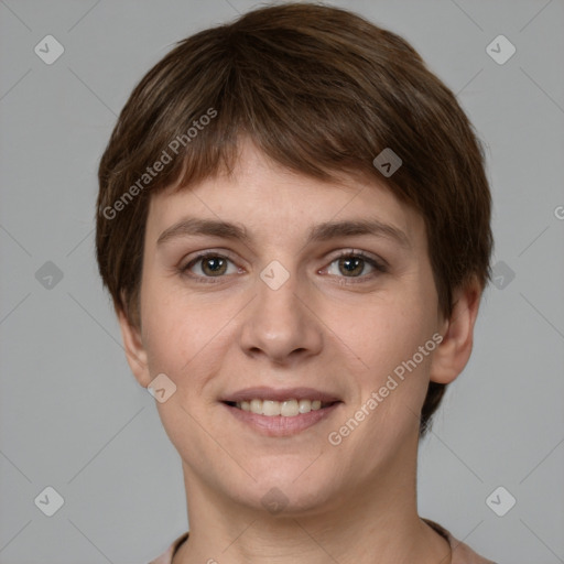 Joyful white young-adult female with short  brown hair and grey eyes