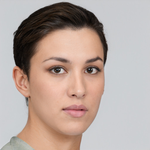 Neutral white young-adult female with short  brown hair and brown eyes