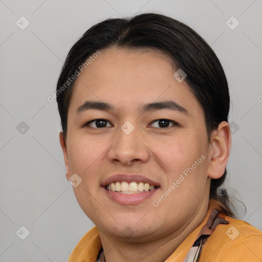 Joyful latino young-adult female with short  brown hair and brown eyes