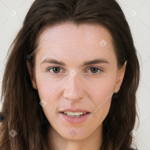 Joyful white young-adult female with long  brown hair and brown eyes